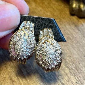 Stunning genuine diamonds set in solid 10 carat yellow gold earrings.